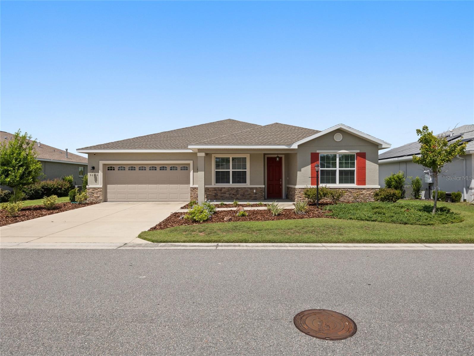 Welcome to this beautifully upgraded Ariana model located in the premier 55+ community of On Top of the World. This 2-bedroom, 2-bath home with a versatile bonus room is perfectly positioned on a premium oversized lot with no neighbors behind, offering peaceful views and exceptional privacy. Inside, elegant tile flooring laid on the diagonal flows seamlessly throughout, while crown molding and a tray ceiling in the spacious great room create a refined, open feel.
The gourmet kitchen is a true centerpiece, featuring gleaming granite countertops, under-cabinet lighting, crown molding on the cabinets, and stainless steel built-in appliances. With generous counter space and an open layout, it’s perfect for both everyday meals and hosting guests. The primary suite offers a large, beautifully tiled walk-in shower, a generous walk-in closet with direct access to the laundry room, and a serene retreat from the rest of the home.
Additional highlights include a screened-in lanai with sun shades for year-round enjoyment and an epoxy-coated tandem garage with plenty of room for your golf cart. Beyond the home, the community delivers an unmatched lifestyle with multiple indoor and outdoor pools, a relaxing spa, a state-of-the-art fitness center, meeting rooms, game rooms, a library, craft studios, and countless clubs and activities to enjoy.
With its maintenance-free exterior, thoughtful upgrades, and one of the most desirable lots in the neighborhood, this home offers the perfect blend of elegance, comfort, and resort-style living.