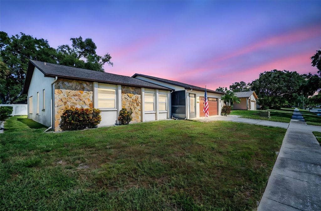 Photo of 346 Cherry Laurel Drive, Palm Harbor, FL 34683 (MLS # TB8413699)