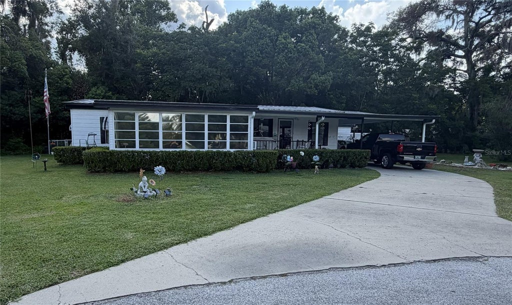 Photo of 6517 SE 110th Lane, Belleview, FL 34420 (MLS # OM730517)