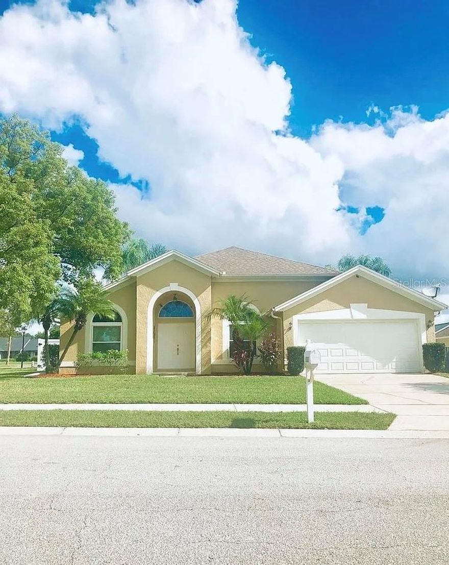 This corner home is completely fenced in and nestled in a neighborhood that has many trees. Welcome home to this spacious 3 bed 2 Full bath home! Vinyl wood flooring throughout the home which is great for entertaining family and friends. High Ceilings also throughout the entire home including the bedrooms. There is an open kitchen, island breakfast bar with storage. There is also 2 Full bathrooms located in the home, makes it wonderful for a guest to come over and have access to their own private bathroom. As you make your way around the house you will find a large master suite with walking closet and master bath followed by two additional bedrooms on the other side of the home. Big fenced in backyard with stone patio area which creates the perfect atmosphere to enjoy a cup of coffee and entertain. The homes roof was replaced in 2023 and plumbing was also updated in 2023 with corresponding permits.  Come see the property as its move in ready.