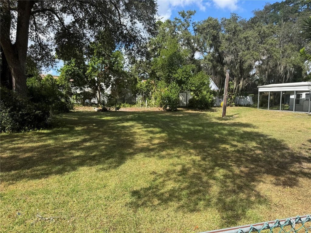 Photo of 9614 N Hartts Drive, Tampa, FL 33617 (MLS # TB8439287)