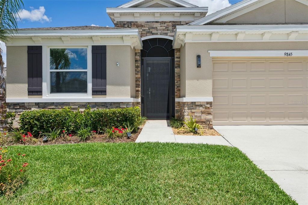 Photo of 9845 Shoreline View Way, Wesley Chapel, FL 33545 (MLS # TB8516959)
