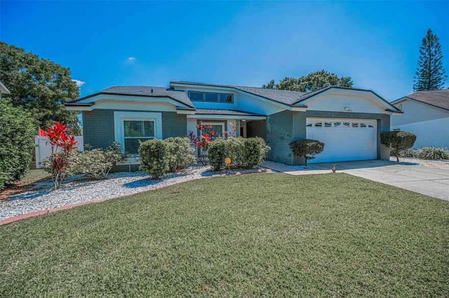 Located in the desirable Fawn Ridge community in the heart of Tampa, this move-in ready pool home showcases extensive updates and pride of ownership. Thoughtfully renovated throughout, the home blends modern comfort with timeless style and functional living spaces designed for everyday ease. Enjoy peace of mind with a newer roof, upgraded energy-efficient windows throughout most of the home, and a new air-conditioning system for year-round comfort. Inside, new flooring flows seamlessly from room to room, complemented by freshly painted ceilings and the removal of outdated popcorn texture for a clean, contemporary feel. The updated kitchen features a stylish center island, newer appliances including washer and dryer, and custom-designed closets that maximize storage and organization. A versatile bonus room provides flexible living space and can easily serve as a den, home office, or craft room. Additional improvements include a fully remodeled shower, refinished fireplace, and new ceiling fans throughout. Energy-efficient enhancements such as newer air ducts, added attic insulation, whole-house water filtration, and solar panels powering the home (buyer to assume low monthly payment) provide long-term value and lower utility costs. Step outside to a private backyard retreat featuring an in-ground, self-cleaning pool with a new heater for year-round enjoyment, a brand-new screened enclosure with tile flooring and ceiling fans ideal for relaxing or entertaining, and a newer vinyl privacy fence with gated access on both sides. A poured concrete slab on the side of the home, offers additional storage or project space. Conveniently located just minutes from Citrus Park Mall, dining, and Tampa International Airport, this beautifully updated pool home offers exceptional value and truly turn-key Florida living.