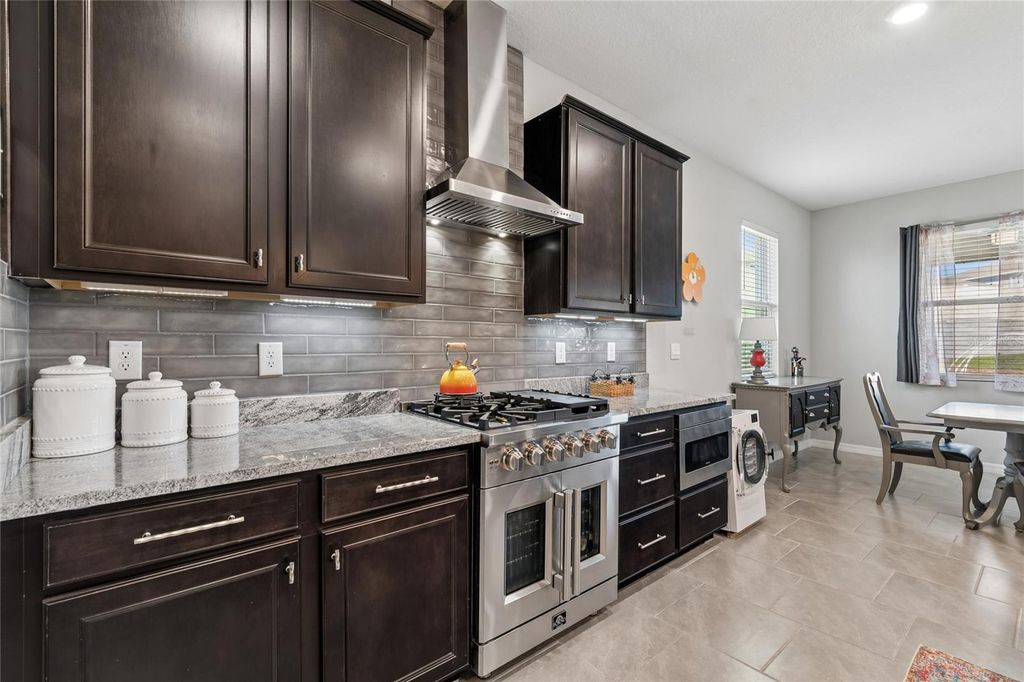 Photo of 9845 Shoreline View Way, Wesley Chapel, FL 33545 (MLS # TB8490468)