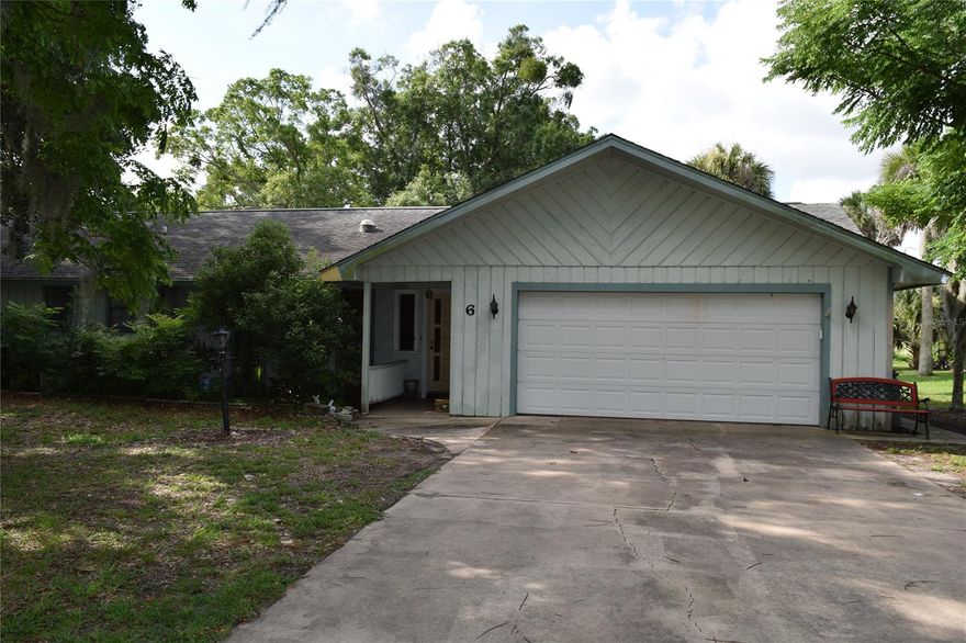 Large golf course front home with loads WITH NEW ROOF. Located on the 4th hole of the New Smyrna Beach Golf Club municipal course. A large living room space leads to a dining room and into another large family room. Huge backyard with a small bridge leading over to the golf course. Great location, close to town. Measurements are approximate and listing information should be independently verified by buyer. ;Water: City