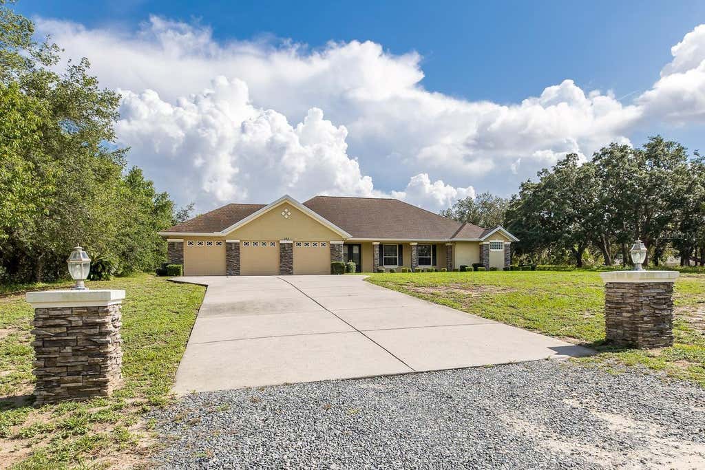 Photo of 343 Royal Palm Way, Spring Hill, FL 34608 (MLS # W7887601)