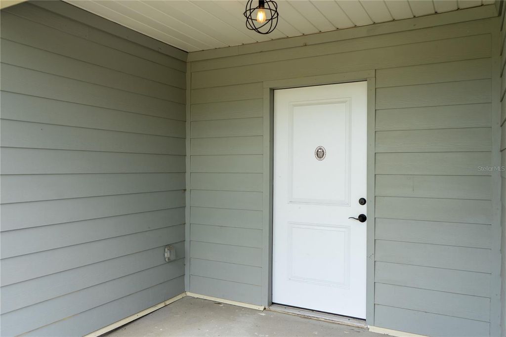 Photo of 5812 Flori Lane, Orlando, FL 32808 (MLS # O6345831)