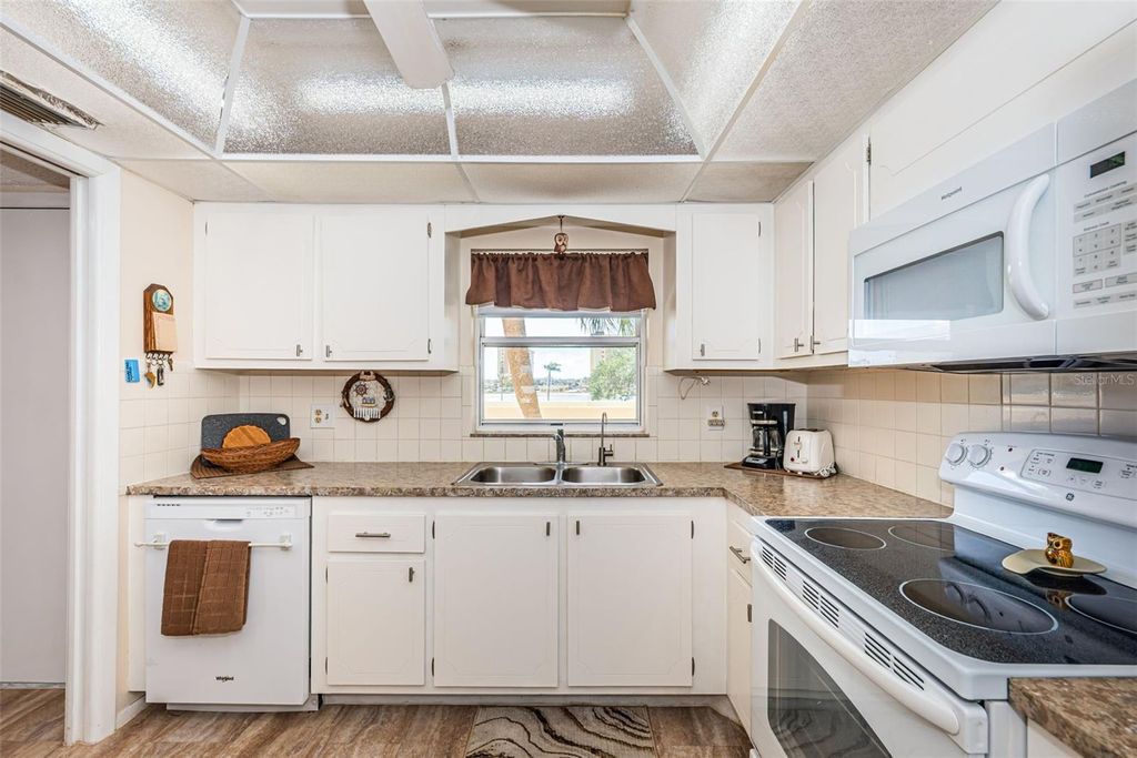 Photo of 4725 Cove Circle #210, St Petersburg, FL 33708 (MLS # TB8501115)