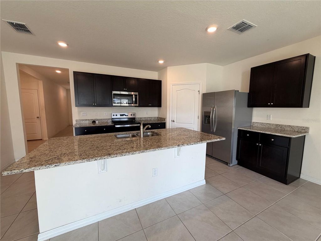 Photo of 4657 Bernard Boulevard, Haines City, FL 33844 (MLS # O6401643)