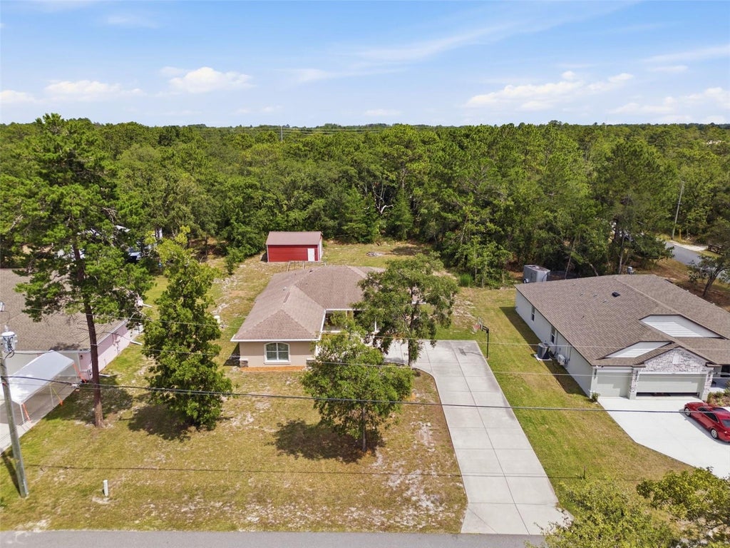 Photo of 11472 Pine Warbler Avenue, Brooksville, FL 34614 (MLS # O6415088)