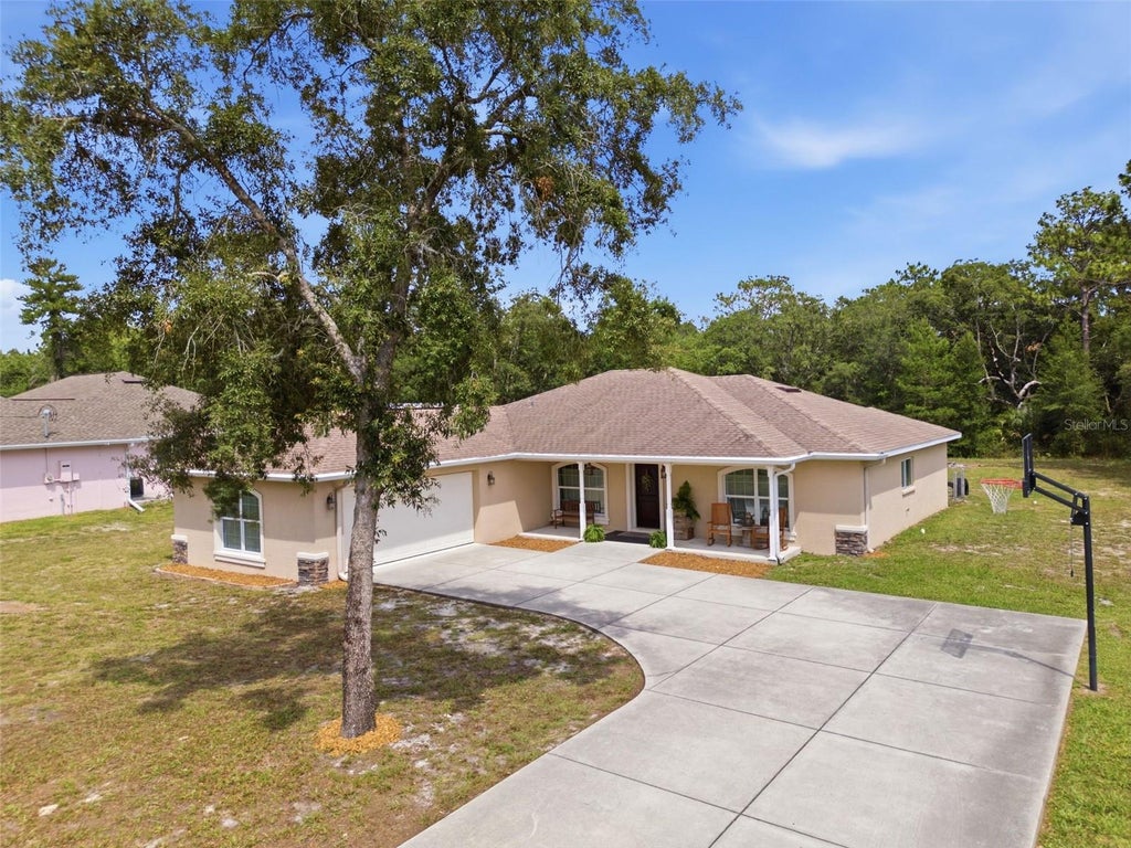 Photo of 11472 Pine Warbler Avenue, Brooksville, FL 34614 (MLS # O6415088)