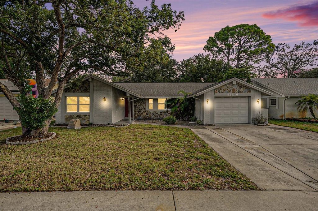 Photo of 12616 Stone House Loop, Hudson, FL 34667 (MLS # TB8440643)