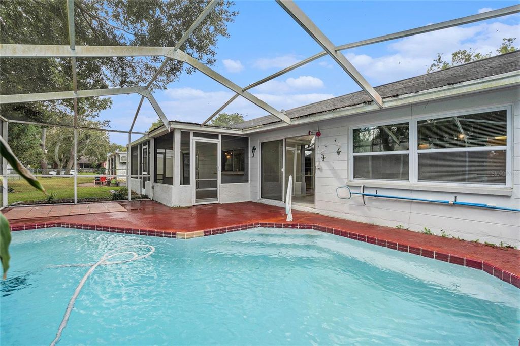 Photo of 12616 Stone House Loop, Hudson, FL 34667 (MLS # TB8440643)