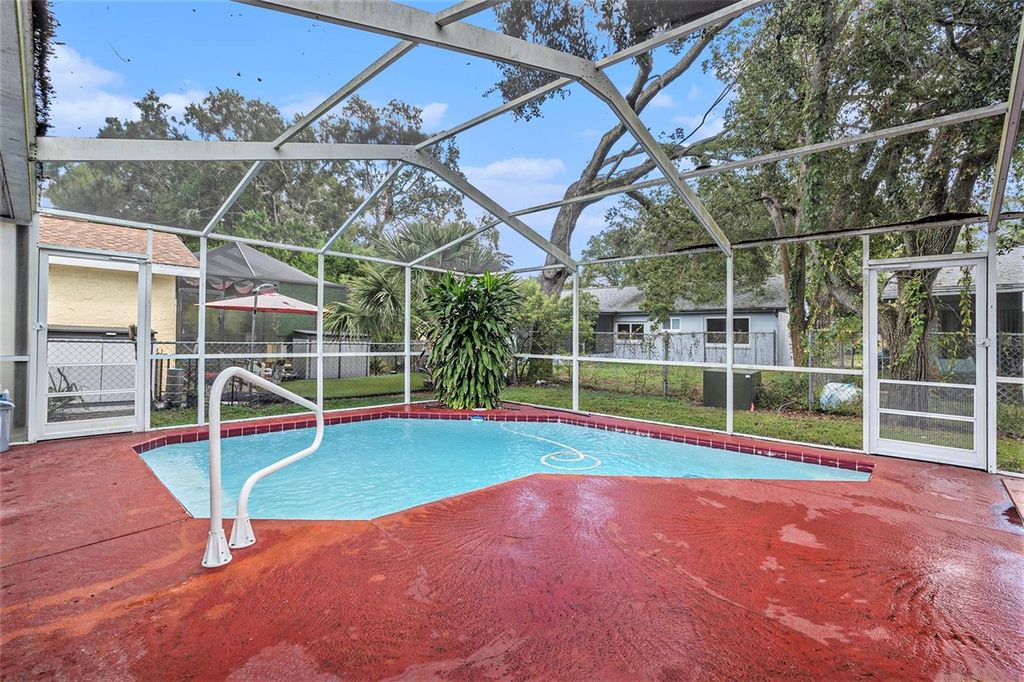 Photo of 12616 Stone House Loop, Hudson, FL 34667 (MLS # TB8440643)