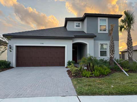 Photo of 31740 Griffin Sands Lane, San Antonio, FL 33576 (MLS # J1004423)