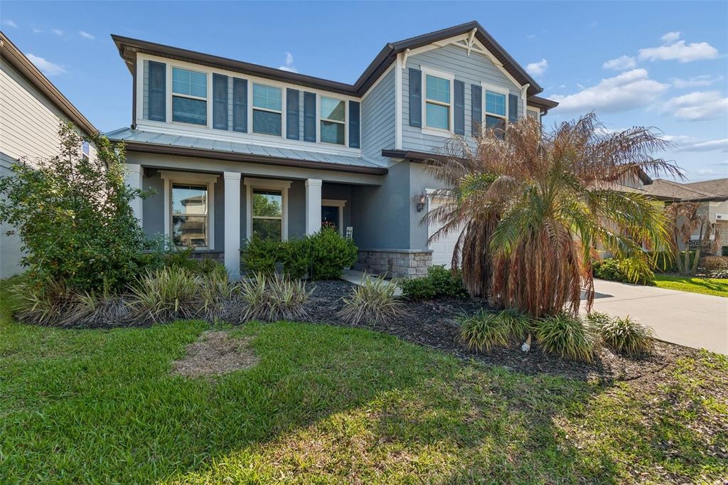 Photo of 7604 Pool Compass Loop, Wesley Chapel, FL 33545 (MLS # OM721811)