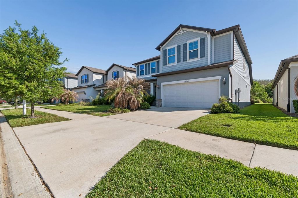 Photo of 7604 Pool Compass Loop, Wesley Chapel, FL 33545 (MLS # OM721811)