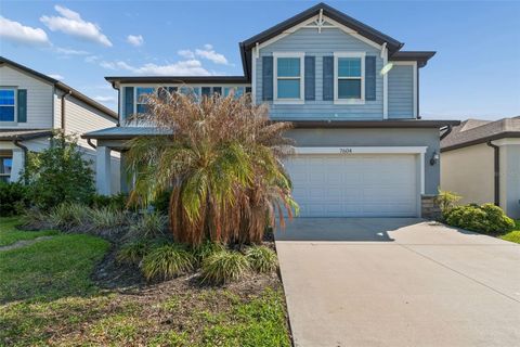 Photo of 7604 Pool Compass Loop, Wesley Chapel, FL 33545 (MLS # OM721811)