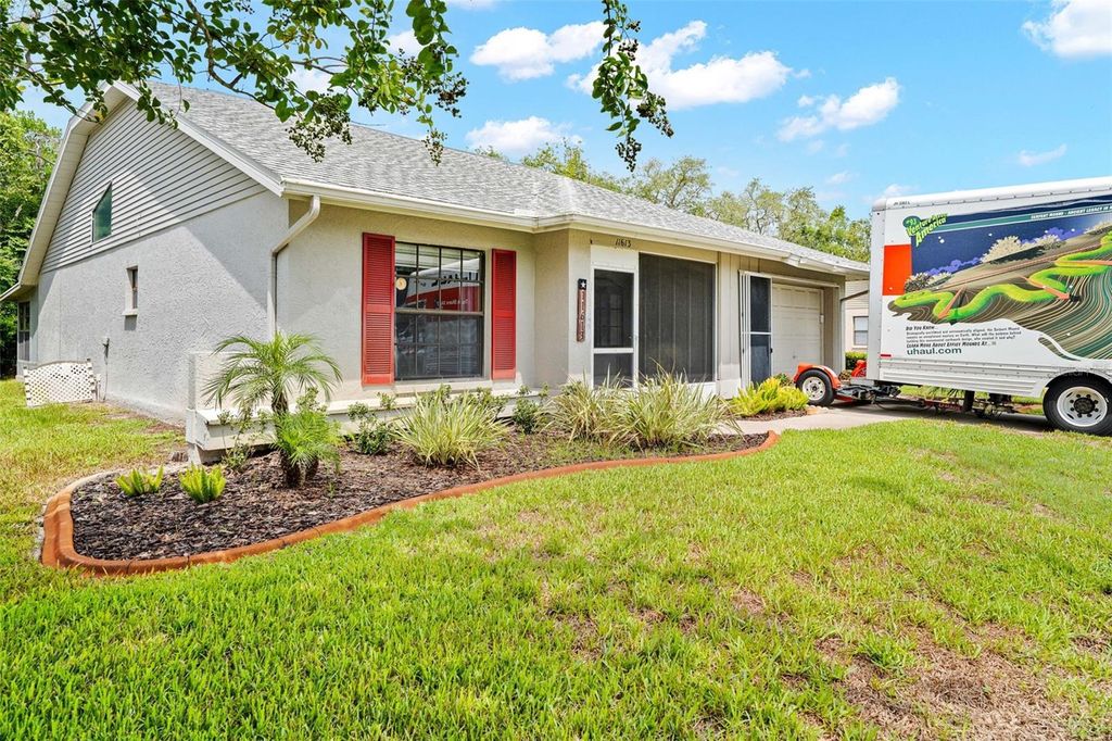 Photo of 11613 Pear Tree Drive, New Port Richey, FL 34654 (MLS # W7887786)