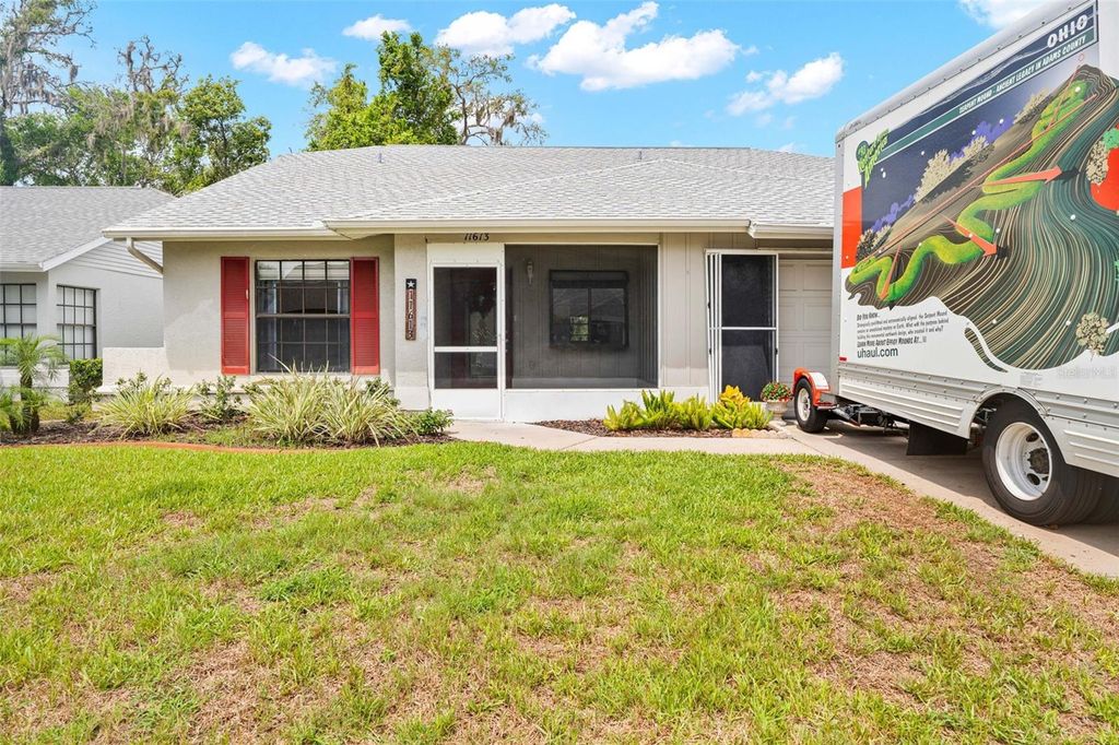Photo of 11613 Pear Tree Drive, New Port Richey, FL 34654 (MLS # W7887786)