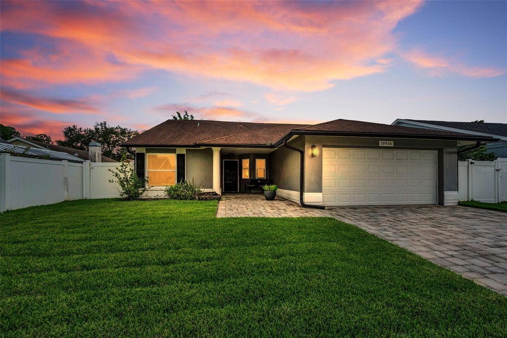 Photo of 11916 Snapdragon Road, Tampa, FL 33635 (MLS # TB8536831)