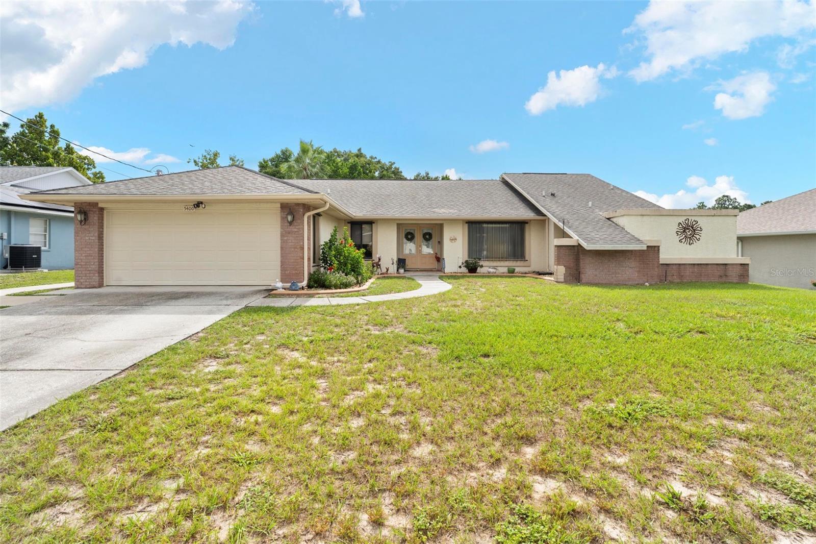 Spring Hill Stunner – 3/2/2 Pool Home with Upgrades Inside & Out!Â
This beautifully maintained 3-bedroom, 2-bath, 2-car garage pool home combines warmth, comfort, and modern upgrades, creating the perfect family retreat.
Inside, the upgraded kitchen shines with solid cherry wood cabinets, quartz countertops, and brand-new LG stainless steel appliances—a chef’s dream! Both bathrooms have been stylishly updated with new cabinets, granite countertops, designer bowl sinks, and new tile flooring. The master bath offers a spa-like experience, while the intimate jacuzzi tub just outside the master suite is surrounded by privacy panels for your own personal retreat.
Enjoy thoughtful touches throughout, including plantation shutters in all bedrooms, porcelain tile in the main living areas, and a cozy, welcoming layout.
Step outside to your private backyard oasis! The screened-in pool is solar-heated, perfect for year-round enjoyment, while the privacy fencing ensures peace and seclusion. New additions like decorative curbing, a side sidewalk, and a back patio slab add charm and function.
For peace of mind, this home also boasts a new air conditioner (July 2025).
Located in a desirable Spring Hill neighborhood, you’ll love the easy access to shopping, dining, schools, and parks—all while enjoying the tranquility of your own private retreat. If you’re looking for a move-in ready pool home with upgrades inside and out, this is the one!