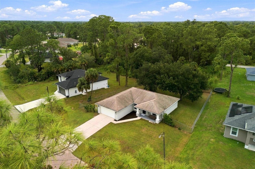 Photo of 2516 33rd Street W, Lehigh Acres, FL 33971 (MLS # A4707209)