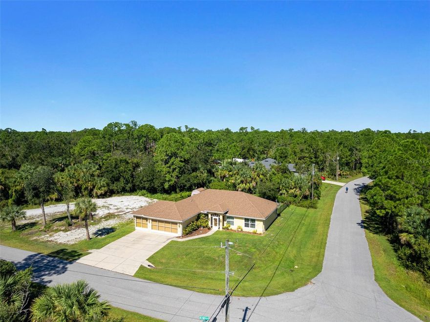 This 2016 BUILT HOME has 3 bedrooms, PLUS a den, 2 baths, over 1800 square feet of living space. Feels even larger! The adjoining lot has been mostly cleared and shelled to park trailers, RV’s, and any other toys you may have. An exterior 30 amp hook up is ready to power your RV, ensuring your travels are stress-free and enjoyable.The screened 3 car garage adds a space for a hobby or two! The outdoor oasis with screened lanai and completely fenced backyard is perfect for enjoying your morning coffee or hosting an outdoor barbecue. There is a shed in the backyard for your outdoor equipment, ensuring a clutter-free garage and living space. Upon entering the home you immediately notice the open floor plan and vaulted ceilings. The kitchen is open to the great room & dinette. You'll find brand new granite countertops, TONS of counter space and storage, stainless appliances, breakfast bar, and newer high-end laminate flooring. The owners suite is to the right with two walk-in closets, and in the bathroom- a large shower, linen closet, and dual vanities with new granite countertops! Barn doors have been installed between the master bedroom and ensuite bath to add privacy. On the opposite side of the home, you will find the two spacious guest rooms and guest bathroom with shower/tub combo. The guest bathroom also has new granite to match the kitchen and master bathroom. (The 2nd guest room was used as a storage room and photo is coming soon.) The home was built in 2016 and feels like a new home. The home is in the X flood zone so no flood insurance will be required by a mortgage lender. The property is also located on a quiet street in a fantastic neighborhood. There are no HOA fees, no CDD fees, and no deed restrictions! So bring your pets and your toys! The home has fairly low insurance as it is newer home and has hurricane shutters for all windows! Close to great schools, medical offices, award winning beaches, golf courses, grocery stores, and the new Wellen Park district with shops, restauraunts and the newly built Braves spring training stadium. The sellers are moving back up north to be near family. Schedule a showing today and prepare to fall in love with your new home!