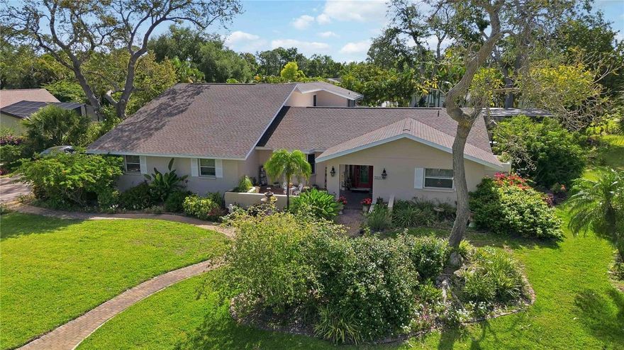 Welcome to Country Place, one of Sarasota’s most desirable neighborhoods.  This 6 bedroom, 3 bathroom home offers over 3,500 sq ft of comfortable living including 2 separate loft bedrooms, perfect for multigenerational families, home offices or additional living areas.  The well-designed split plan offers plenty of flexible space for everyone and everything. The main living room area lets in plenty of natural light and features vaulted ceilings and a wood-burning fireplace.  Generous living and dining spaces offer functionality and comfort, with upgraded bay windows and genuine wood floors.  The kitchen was remodeled in 2021 with granite countertops, stainless steel appliances and a large island.  The home has plenty of storage options with a spacious laundry room and plenty of oversized closets. 
Set on a beautifully landscaped lot, the property showcases mature gardens and lush tropical surroundings, creating a private, oasis-like setting. The large screened-in lanai boasts a 40 foot pool with waterfall and plenty of space for relaxing and enjoying outdoor living.
***New roof 2024, New Irrigation Well 2026, New AC 2018, New Garage Door 2018, Pool Resurfaced 2015***
Conveniently located in Sarasota near Siesta Key beaches, top rated schools, shopping, dining, hospitals, Red Bug Slough Preserve and the UTC area, this gem of a home offers both privacy, space, and a highly desirable location.  Don't wait on this one, chedule your tour today!