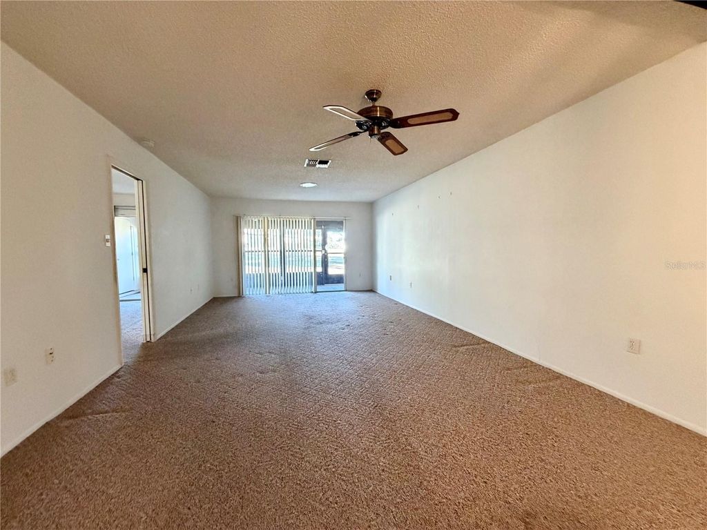 Photo of 11210 Dollar Lake Drive #2, Port Richey, FL 34668 (MLS # W7883168)