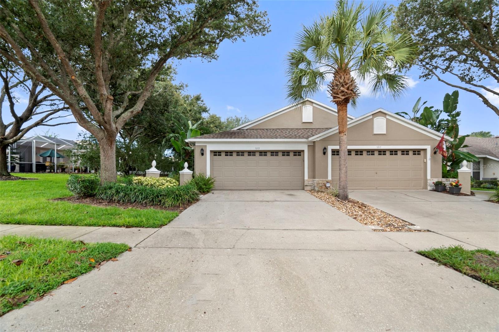 3/2/2 – Beautiful pond view villa located in the gated and maintenance free community of Phoebe Park. This one story 3 bedroom, 2 bath, 2 car garage provides an opportunity to enjoy the Florida lifestyle. You first step into a bright and spacious living and dining room area with recently installed laminate flooring with triple sliding doors leading to a covered and screened patio. With the pond in the back and mature trees, the patio provides the ultimate in privacy to relax or entertain. As a bonus, patio was prewired for a hot tub. The extra-large primary bedroom includes a large sitting area with triple sliding doors that flow out onto the patio allowing you to wake up to natural light and that magnificent view. The primary bedroom has an en-suite bathroom with a walk-in closet, dual vanities, a garden soaking tub, and separate shower. Off of the living room is the kitchen with recently added stainless steel appliances and eat-in area and a breakfast bar. The two additional bedrooms are on the opposite side of the kitchen for a split floor plan for added privacy. Recent improvements include fresh neutral paint, water softener and filter, an under sink reverse osmosis system, water heater, new lighting fixtures, and new faucets. Furnishing available as negotiated by buyer and seller's agent to provide for quick move in. Seller is offering a 1-year home warranty for peace of mind. The current monthly maintenance fee covers landscaping, lawn, exterior painting, roof replacement, and access to a private pool for Phoebe Park residents only. Owners will also have access to all the extensive amenities of Fishhawk Ranch. Zoned for Fishhawk Creek Elementary, Randall Middle School, and Newsome High School. The lot and location are within walking distance of the park square, schools, trails, aquatic center, fitness center, and other community amenities. Downtown Tampa, Orlando, beautiful beaches, and golf courses are a short drive. Schedule your showing today.