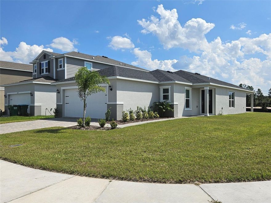 Stunning like new construction located on a premium corner lot in the highly desirable Sanctuary community in Clermont, FL. This beautifully designed 3-bedroom, 2-bathroom home offers 1,511 sq ft of thoughtfully planned living space with a modern open-concept layout ideal for today’s lifestyle.

The spacious kitchen features a large island, stainless steel appliances, and seamless flow into the dining and living areas, perfect for entertaining and everyday living. Natural light fills the home, enhancing its bright and welcoming atmosphere. Step outside to the covered lanai, an ideal space to relax or host gatherings.

Additional highlights include a 2-car garage, generous lot size, and the added privacy and curb appeal that comes with a corner homesite.

Residents enjoy resort-style amenities including a community pool, clubhouse, fitness center, and walking trails. Conveniently located with quick access to US-27, shopping, dining, hospitals, and major roadways, this home offers both comfort and connectivity.

Whether you're a first-time buyer, relocating, or looking for a smart investment in one of Clermont’s fastest-growing areas, this opportunity deserves your attention.

Schedule your private showing today, homes in this community are selling quickly.