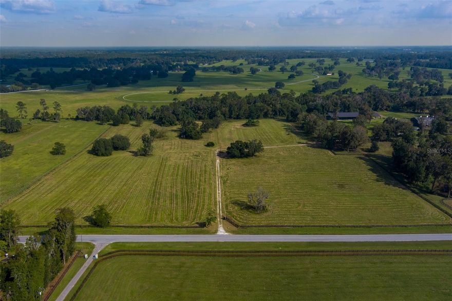 Offering 28+ acres of fully fenced land, just 12 minutes from the World Equestrian Center, this property is located on the historically established street of 225A, surrounded by distinguished farms. With mature trees that provide natural beauty and shade, the land creates a peaceful, scenic setting perfect for equestrian or agricultural pursuits. It offers an ideal canvas for those looking to design a custom equestrian estate or retreat with convenient access to premier equestrian venues.