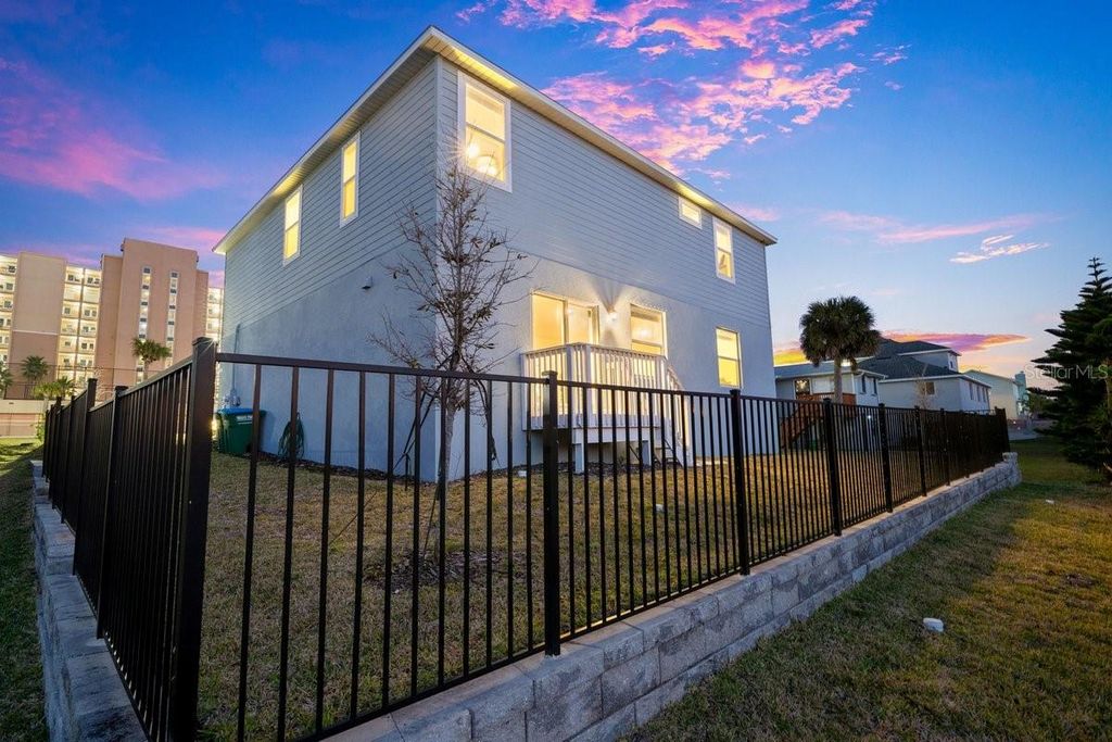 Photo of 3828 S Atlantic Avenue, Daytona Beach Shores, FL 32118 (MLS # V4947067)