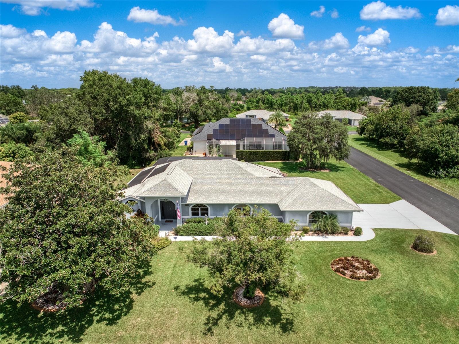 Located in the highly desirable Manor Hill community of Sun N Lake Estates in Sebring, FL - this charming residence is ready for new owners to enjoy all it has to offer! Featuring 3 bedrooms on a split floor plan, 2 full bathrooms, in-ground heated concrete pool, excellent corner lot location, and even the golf cart is included with the sale! Walking through the impressive front entryway, the bright and inviting living room with formal dining area flows into a spacious well-appointed kitchen with a breakfast nook that overlooks the sparkling pool deck. The enclosed, air-conditioned porch offers the perfect spot to relax while enjoying serene pool views year-round. With the in-ground concrete solar-heated pool, the possibility of enjoying this pool year-round is present! You will love the cascading waterfall this pool features as well. The primary suite boasts a generous walk-in closet and a luxurious bathroom with a jacuzzi-style soaking tub. The huge 2-car garage also includes space for the included golf cart, perfect for enjoying the neighborhood’s resort-style amenities. Swimming pool solar heater installed in 2019, New roof in 2022, New HVAC system in 2023. As a resident of Sun ‘n Lake, you’ll enjoy access to two championship golf courses, pickleball and tennis courts, a fitness center, nature trails, and so much more!