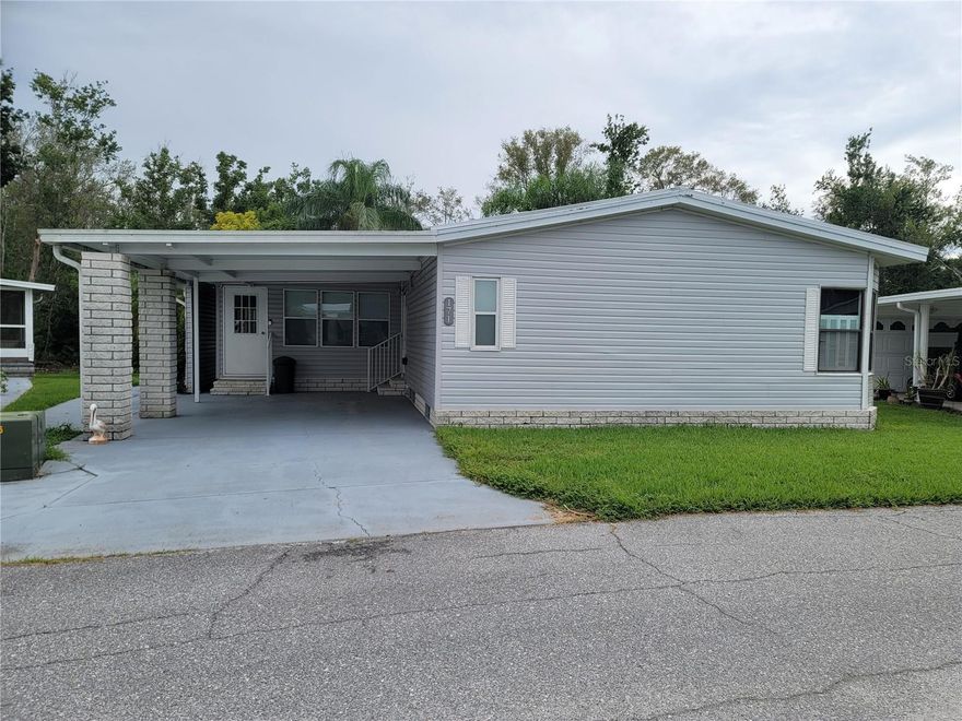 Own YOUR OWN LAND and this Adorable 2 Bedroom, 2 Full Bath mobile home in a 55+, Sweetwater Community. Shed with Window unit located in rear of home. New Siding, Completely re-plumbed in 2025. New Metal Roof and AC replaced in 2024. Laundry room is inside kitchen. Community offers Clubhouse, 18 hole Golf Course,  Pool and Hot Tub, Tennis and Pickle Ball Courts, Shuffleboard ,Fitness Room, Boat Ramp access to Lake Henry, boat slips available. All room sizes are approximate.