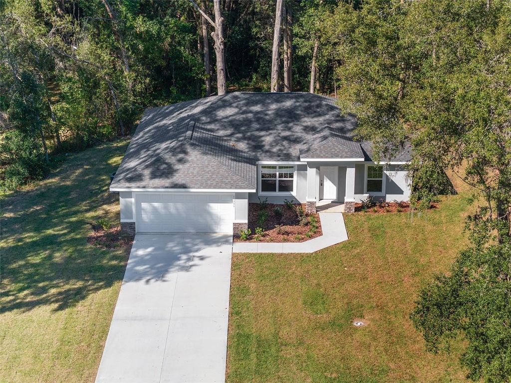 Photo of 9965 SW 192nd Circle, Dunnellon, FL 34432 (MLS # OM716040)