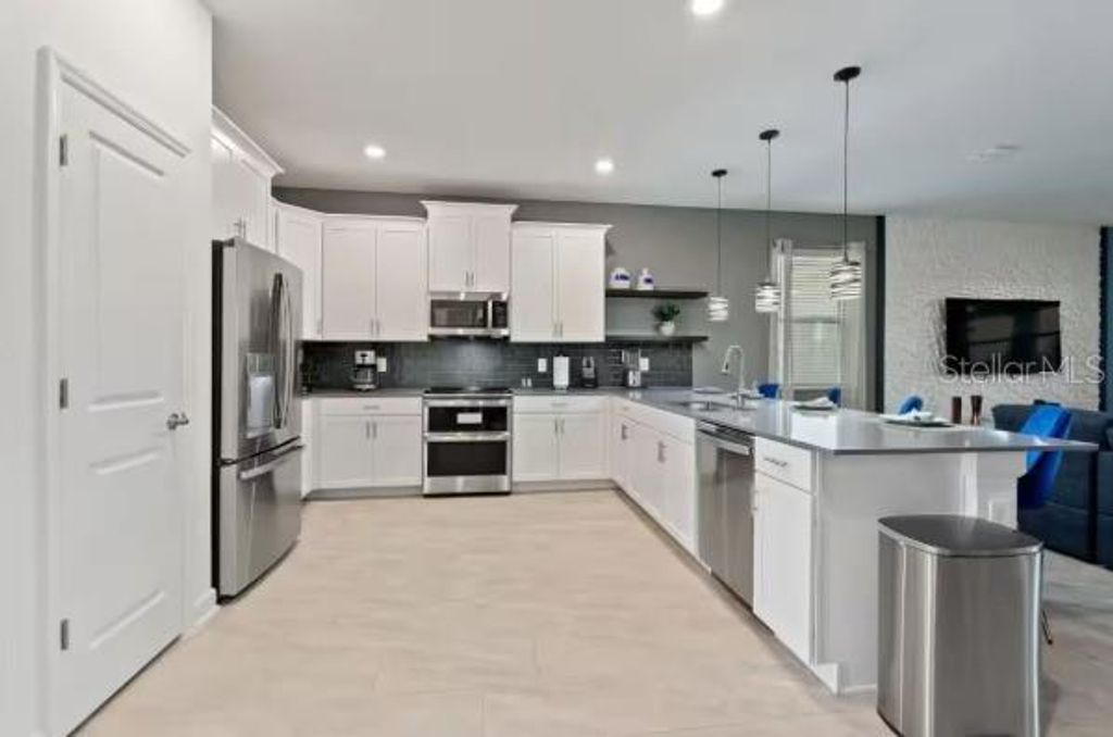 Photo of 9254 Sommerset Hills Drive, Davenport, FL 33896 (MLS # O6403522)