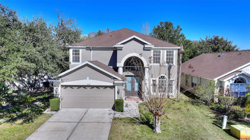Photo of 9020 Pecky Cypress Way, Orlando, FL 32836 (MLS # O6378069)