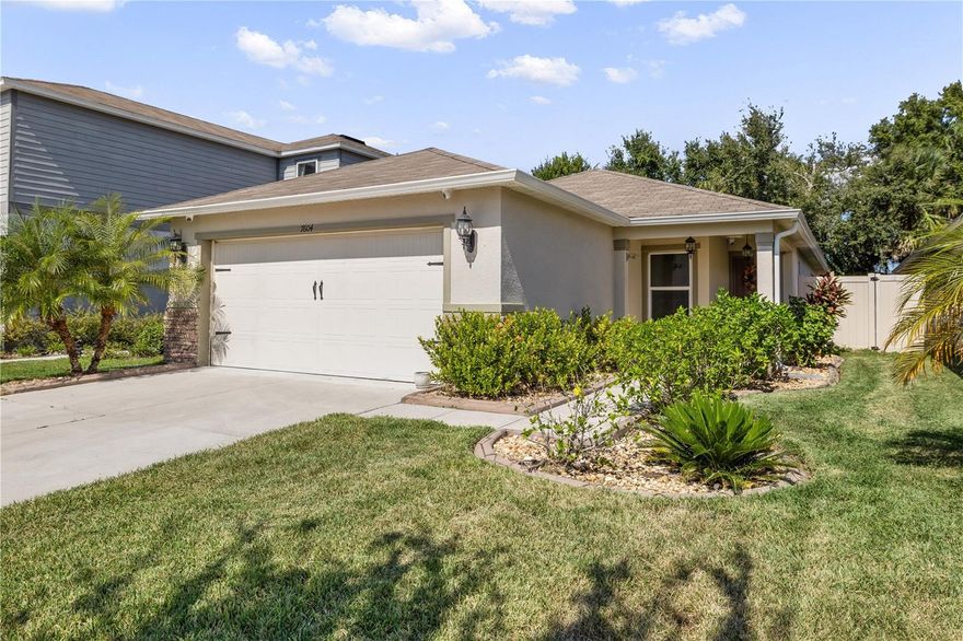 Built in 2018 and refreshed to perfection, this four-bedroom, two-bath modern home blends clean design, comfort and value in a gated, secure community. Featuring a spacious open floor plan, new luxury tile flooring and abundant natural light throughout, every detail has been carefully updated for a move-in-ready experience. The chef’s kitchen is the centerpiece of the home, complete with a large quartz island, upgraded cabinetry and a premium refrigerator package, ideal for entertaining and everyday living. The primary suite offers a relaxing retreat with dual vanities, modern finishes and generous closet space. Additional highlights include fresh interior paint, enhanced trim details and thoughtfully chosen accent tones that give the home a bright, like-new feel without the new construction price tag. Positioned on a 4,567-square-foot lot in a desirable gated neighborhood, this home provides convenience, style and efficiency, all just minutes from shopping, dining and easy access to downtown Tampa.