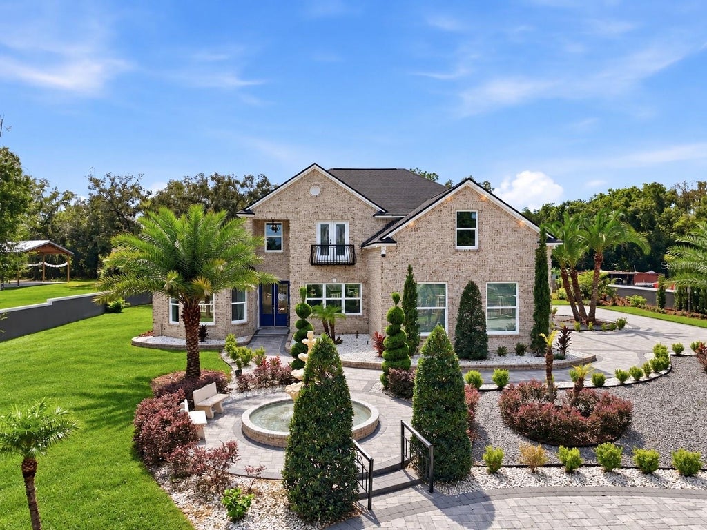 Photo of 416 W Socrum Loop Road, Lakeland, FL 33809 (MLS # O6446831)