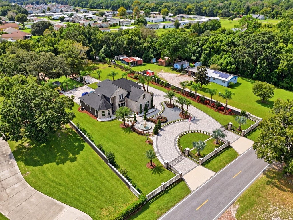 Photo of 416 W Socrum Loop Road, Lakeland, FL 33809 (MLS # O6446831)