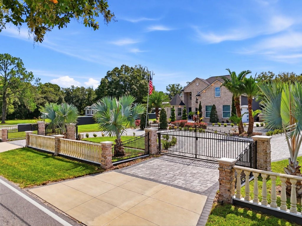 Photo of 416 W Socrum Loop Road, Lakeland, FL 33809 (MLS # O6446831)