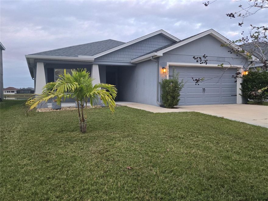 Welcome Home to the Florida Lifestyle when you arrive at 3953 White Ibis Road in Lakeland. This three bedroom, two bath home features a sunny, open living area and kitchen with a counter-height island, walk-in pantry, and adjacent dining cafe, all under an airy volume ceiling. The kichen comes with a Samsung stainless steel electric range & refrigerator, a Samsung stainless steel over the range microwave and a Samsung stainless steel dishwasher. A private owner's suite complete with a large 10' x 08' walk-in wardrobe and a large en-suite bath including dual vanities, a large tiled shower, a linen closet, and a closeted toilet. You will also find a laundry room with drop zone at the garage entry. A covered lanai accessed from the cafe adds enjoyment to your Florida seasons. Towne  Park Estates offers you 2 community pools, playgrounds, benches along the lakes and ponds, a clubhouse, and a dog park! Towne Park Estates is a highly desirable community in a great location close to Publix and Lakeside Village.You can witness the annual SUN 'n FUN airshow and even watch the event in the comfort of your own yard.