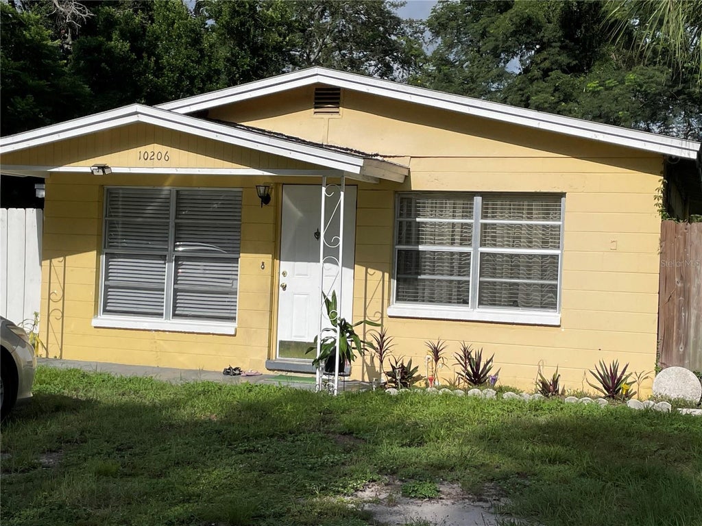 Photo of 10206 N 24th Street, Tampa, FL 33612 (MLS # TB8546040)