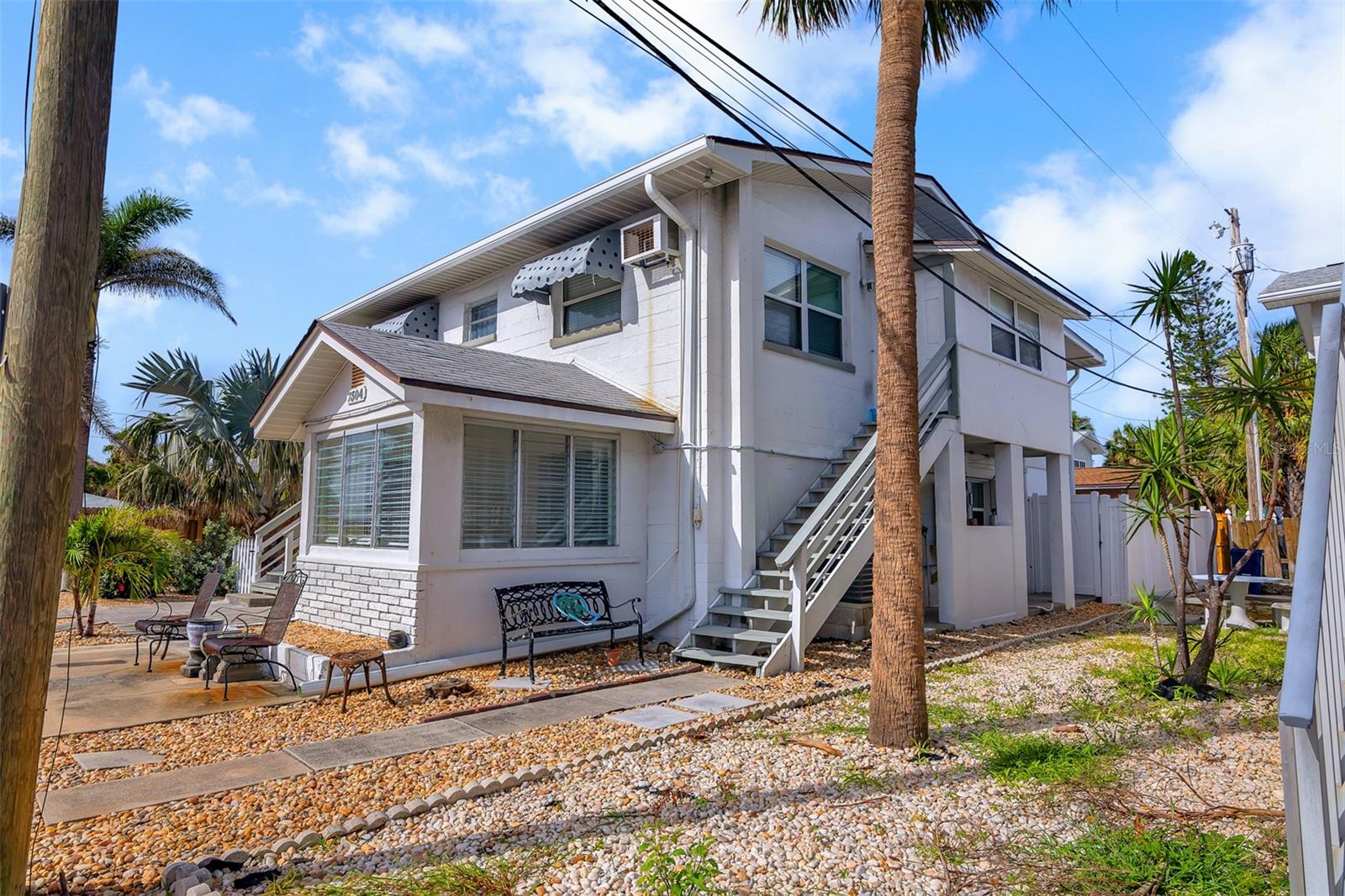 Seller is offering $25,000, which may be provided as a check at closing or applied toward the buyer’s closing costs, at the buyer’s discretion. Exceptional investment opportunity in St. Pete Beach. Renovations to the two first-floor apartments have been completed and inspected by the City of St. Pete Beach, including new bathrooms, cabinets, two new electrical panels, complete rewiring, all-new outlets, new appliances, and more. All work has been performed and guaranteed by licensed contractors. The owner is willing to assist with buyer closing costs. Located in one of the nation’s most celebrated beach destinations—renowned for its soft, powdery sand and serene, crystal-clear waters—this exceptional, fully furnished, multi-unit property presents a rare investment opportunity with both immediate income and long-term value. This well-maintained fourplex features four distinct units within a single, solid-block building, offering significant savings on insurance costs. Each apartment has its own electric meter, ensuring tenant autonomy and simplifying property management. The sprinkler system is fully operational, reflecting the high maintenance standards upheld by the current owners, who have resided on-site for many years. The property includes three 1-bedroom, 1-bathroom units—two currently rented short-term and one occupied by a long-term tenant for over 10 years—and one 2-bedroom, 1-bathroom unit currently used as the owner’s private residence. Average rental income is approximately $1,800 month for a 1-bedroom and $2,400 for a 2-bedroom. There is also potential for a fifth apartment in the garage, which already has two drains in place for a bathroom and kitchen, offering an additional revenue stream. This is a turnkey investment in a premier St. Pete Beach location, ideal for capitalizing on one of Florida’s most sought-after coastal markets. Don’t miss this chance to acquire a high-quality, income-generating property in a prime beachside setting. The seller is motivated and open to working with serious buyers to ensure a smooth and successful transaction.