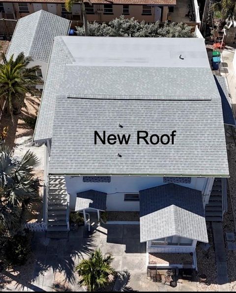 Photo of 7304 Coquina Way, St Pete Beach, FL 33706 (MLS # S5112294)