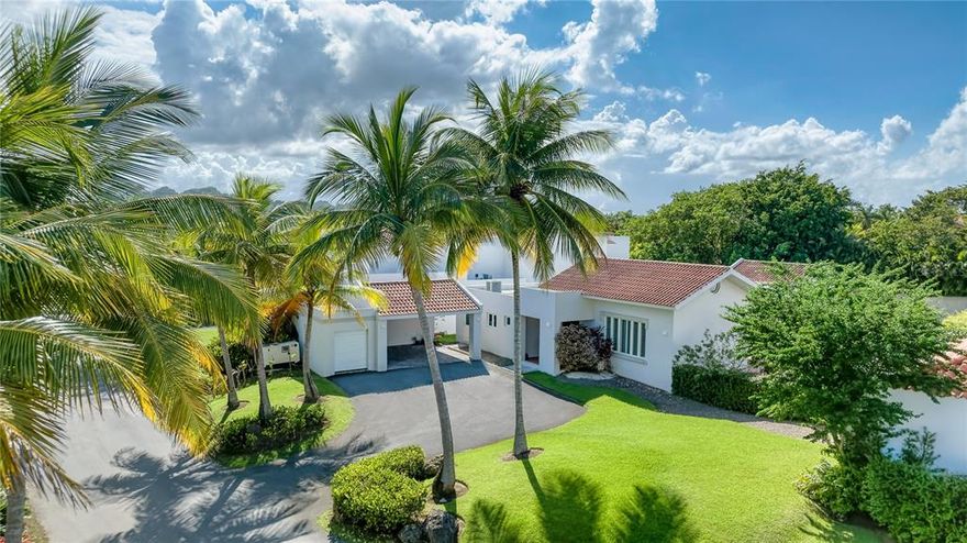 ***SOLD*** Rare to market opportunity within the Dorado Beach Resort, this expansive blank canvas is set for transformation. Custom features, wooden accents and an inviting atmosphere enrich the residence. Three bedrooms, three bathrooms and a powder room are distributed throughout the 2,562 Sq. Ft. interior floor plan. The dining room with cathedral ceiling seamlessly connects to the kitchen, living area and covered patio that leads out to the ample backyard with manicured landscaping. A laundry room, storage and two-vehicle carport complete the property. Dorado Beach is the premier resort in the Caribbean. Residents enjoy exclusive access to world-renowned amenities such as top golf courses, spa sanctuary, fitness center, biking trails, water sport facilities, beaches and more. A 35-minute drive from San Juan and an additional 10 minutes to SJU airport. Experience the epitome of resort living while still being near the city. Monthly HOA: $850.