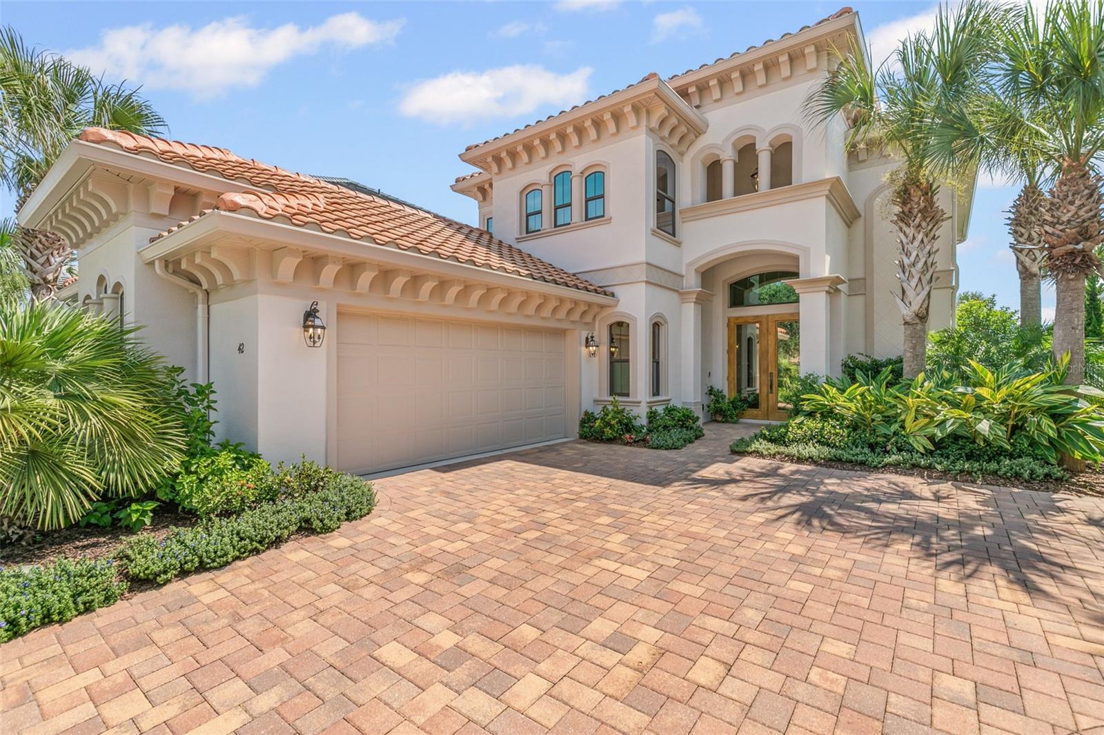 Welcome to this stunning lakeview two-story pool home overlooking the 7th fairway of the renowned ocean course at Hammock Beach Resort. Built in 2018, this meticulously maintained residence offers 3 bedrooms, 3 1/2 baths, office, 2 car garage and 2903 sq. ft. of beautifully designed living space. Inside you'll find an open floor plan with abundant natural light, perfect for entertaining and everyday living. The kitchen and living areas flow seamlessly to the outdoor space, where expansive golf course views can be enjoyed while soaking in the saltwater pool or spa. Features a luxurious primary ensuite with dual walk-in closets and direct access to the pool area. The upgraded bathrooms feature modern finishes and thoughtful design elements, incorporating the home's stylish interiors. Located within the highly sought-after Ocean Hammock Resort community, where residents enjoy world-class amenities, a premier coastal lifestyle and unparalleled access to golf, dining, and a short walk to the Atlantic shoreline. Short commute to Daytona Beach to the south or Historic St. Augustine to the north.