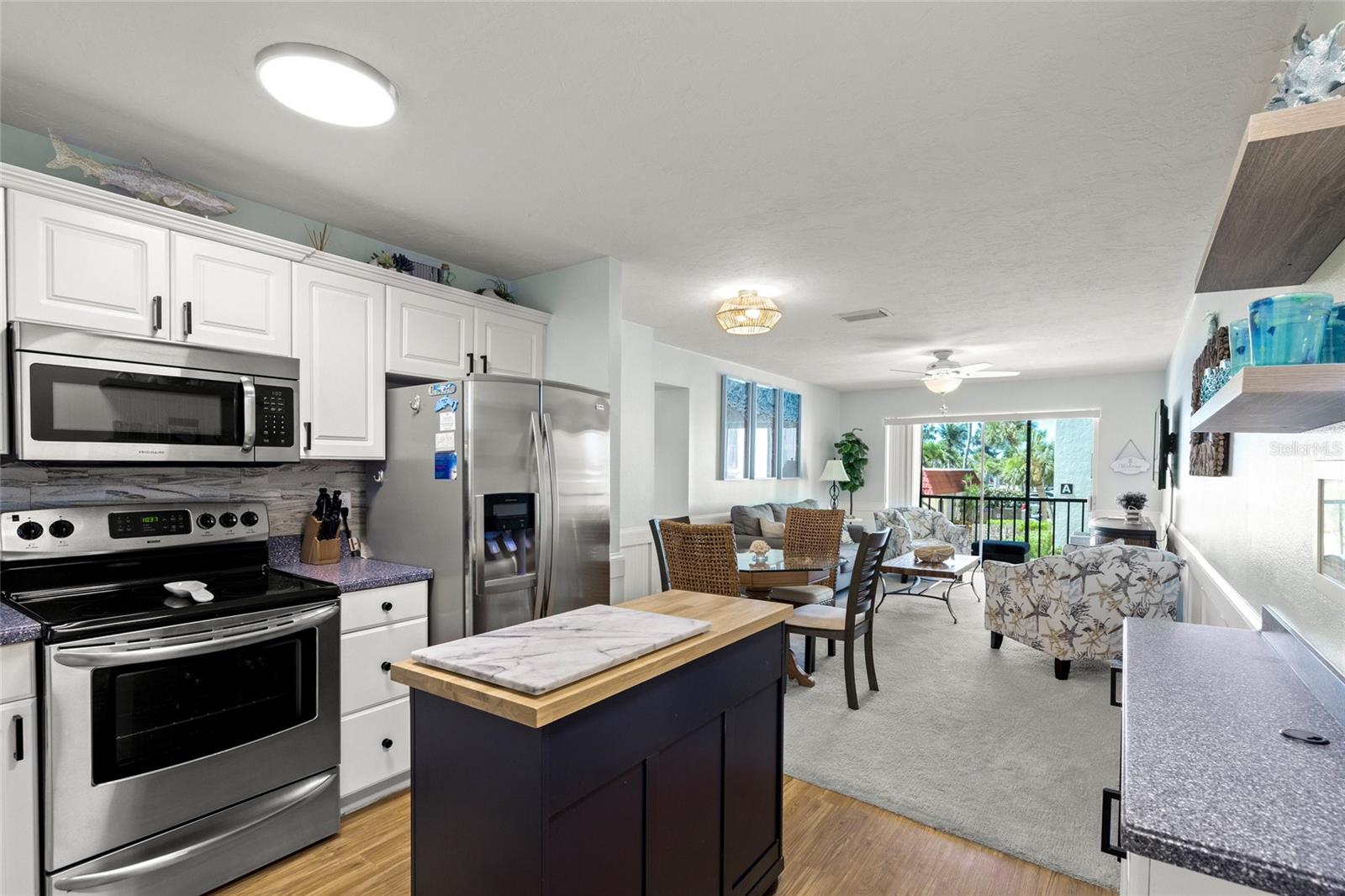 Come check out this newly renovated turnkey condo that sits just across the street from one of the #1 beaches in America! This 2 bedroom 1 bathroom condo with open floor plan overlooking the pool and courtyard, is perfect for your new home or investment opportunity near the beach. Some updates include, new carpet, light fixtures, furniture, lanai furniture and decor. La Siesta has on site management with their own rental program and also uses Airbnb to capture those seasonal renters & weekly rentals are allowed. Amenities include a heated salt water pool, outdoor grills, elevator, covered parking, guest parking, shuffleboard, clubhouse w pool table and workout equipment & washer/dryer on each floor of building. Each condo comes with a storage unit w all your essentials for the beach. The public beach has 2 tiki bars and small store. The trolleys, frog hop & multiple other transportation opportunities run all day for a free ride to the village to enjoy your favorite restaurants, shopping and grocery store. Make your appointment today!